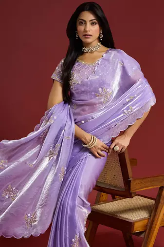 Lilac tissue satin embellished saree with unstitched blouse piece.