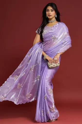 Lilac tissue satin embellished saree with unstitched blouse piece.