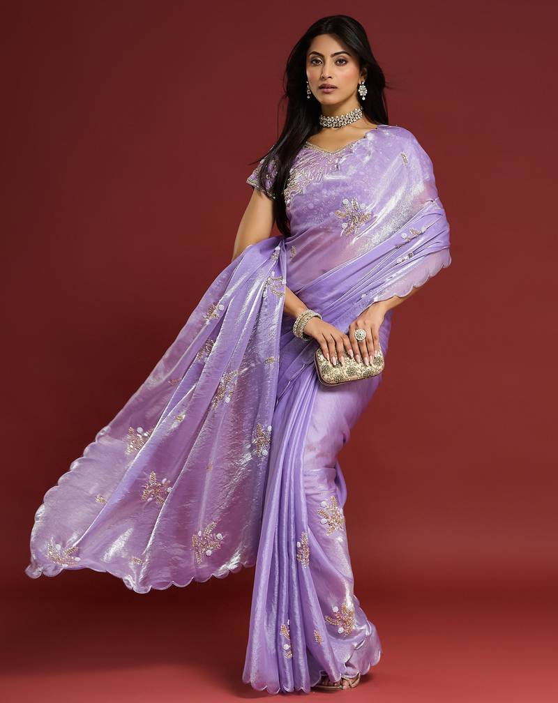 Lilac tissue satin embellished saree with unstitched blouse piece.