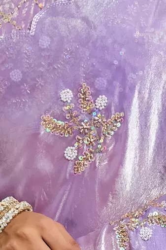 Lilac tissue satin embellished saree with unstitched blouse piece.