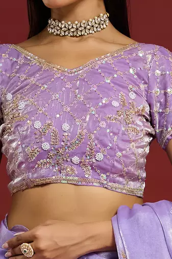Lilac tissue satin embellished saree with unstitched blouse piece.