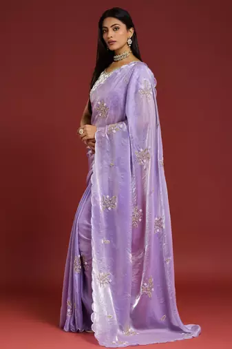 Lilac tissue satin embellished saree with unstitched blouse piece.
