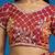 Orange tissue satin embellished saree with unstitched blouse piece.