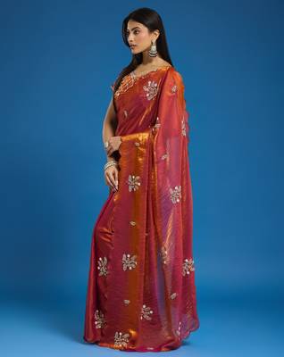 Orange tissue satin embellished saree with unstitched blouse piece. 5