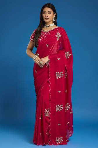 Rani tissue satin embellished saree with unstitched blouse piece.