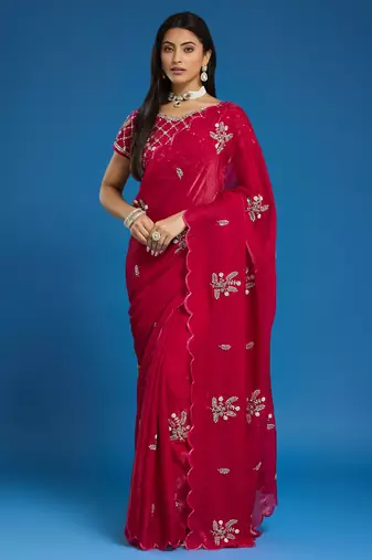 Rani tissue satin embellished saree with unstitched blouse piece.