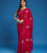 Rani tissue satin embellished saree with unstitched blouse piece.