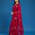Rani tissue satin embellished saree with unstitched blouse piece.