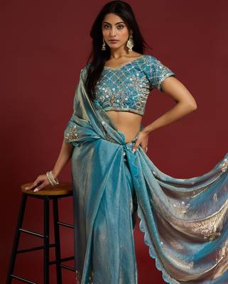 Sky blue tissue satin embellished saree with unstitched blouse piece. 2
