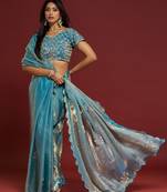 Sky blue tissue satin embellished saree with unstitched blouse piece.