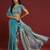 Sky blue tissue satin embellished saree with unstitched blouse piece.