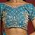 Sky blue tissue satin embellished saree with unstitched blouse piece.