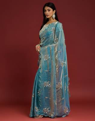 Sky blue tissue satin embellished saree with unstitched blouse piece. 5