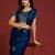 Teal tissue satin embellished saree with unstitched blouse piece.