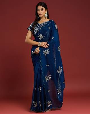 Teal tissue satin embellished saree with unstitched blouse piece. 1