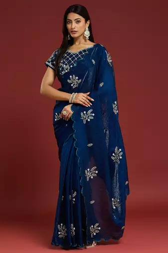 Teal tissue satin embellished saree with unstitched blouse piece.