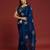Teal tissue satin embellished saree with unstitched blouse piece.