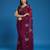 Wine tissue satin embellished saree with unstitched blouse piece.