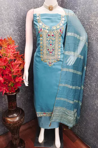 Sky blue roman silk embroidered unstitched suit with heavy santoon bottom and chanderi jacquard dupatta