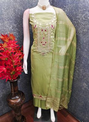 Green roman silk embroidered unstitched suit with heavy santoon bottom and chanderi jacquard dupatta 2