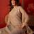 Beige silk blend woven design kurta set with dupatta.