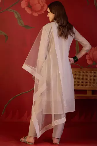 Beige silk blend woven design kurta set with dupatta.