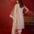 Beige silk blend woven design kurta set with dupatta.