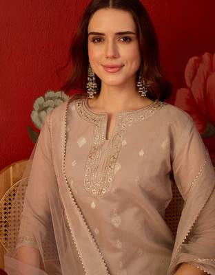 Beige silk blend woven design kurta set with dupatta. 5