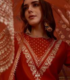 Rust silk blend embroidered kurta set with dupatta.