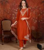 Rust silk blend embroidered kurta set with dupatta.