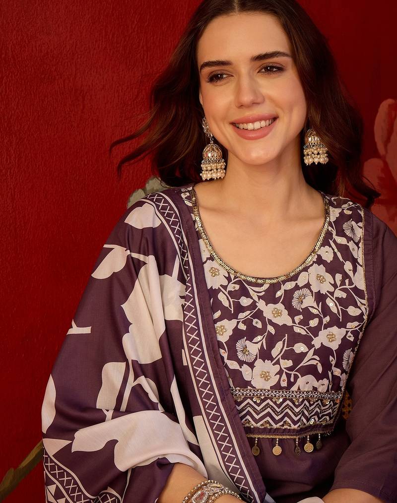Wine silk blend embellished kurta set with Dupatta.