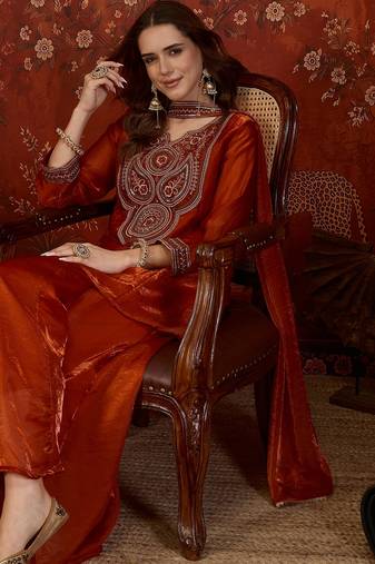 Rust tissue satin embroidered kurta sharara set.