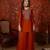 Rust tissue satin embroidered kurta sharara set.