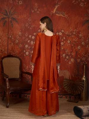Rust tissue satin embroidered kurta sharara set. 4