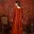 Rust tissue satin embroidered kurta sharara set.