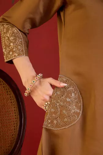 Brown silk blend embroidered kurta set with Dupatta.