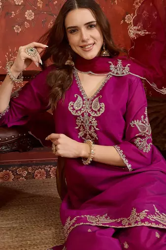 Rani silk blend embroidered kurta Plazzo Set with dupatta.