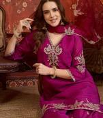Rani silk blend embroidered kurta Plazzo Set with dupatta.