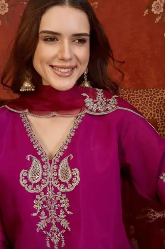 Rani silk blend embroidered kurta Plazzo Set with dupatta.