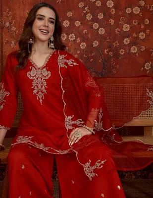 Red silk blend embroidered kurta plazzo set with dupatta. 1