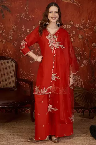 Red silk blend embroidered kurta plazzo set with dupatta.