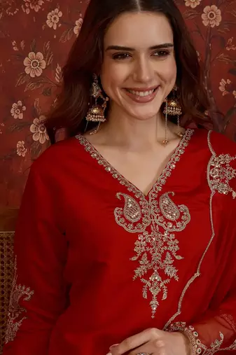 Red silk blend embroidered kurta plazzo set with dupatta.