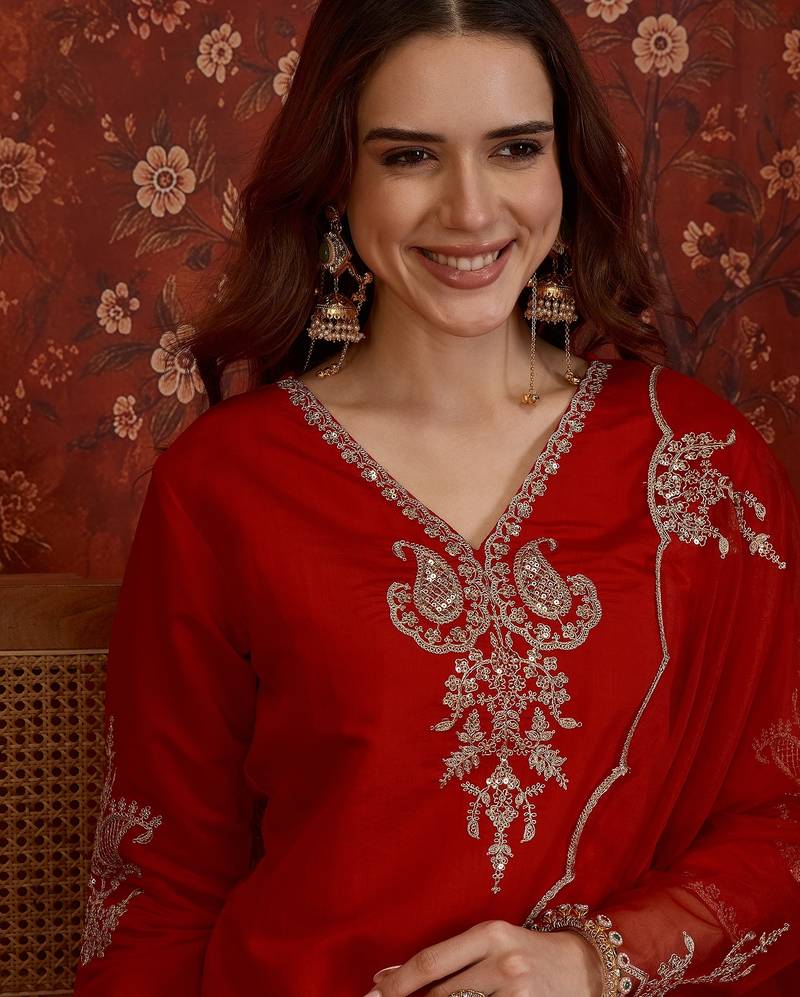 Red silk blend embroidered kurta plazzo set with dupatta.