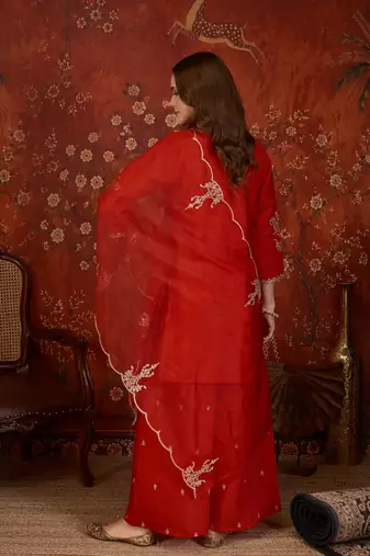 Red silk blend embroidered kurta plazzo set with dupatta.