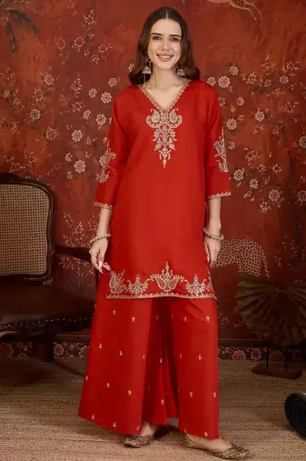 Red silk blend embroidered kurta plazzo set with dupatta.