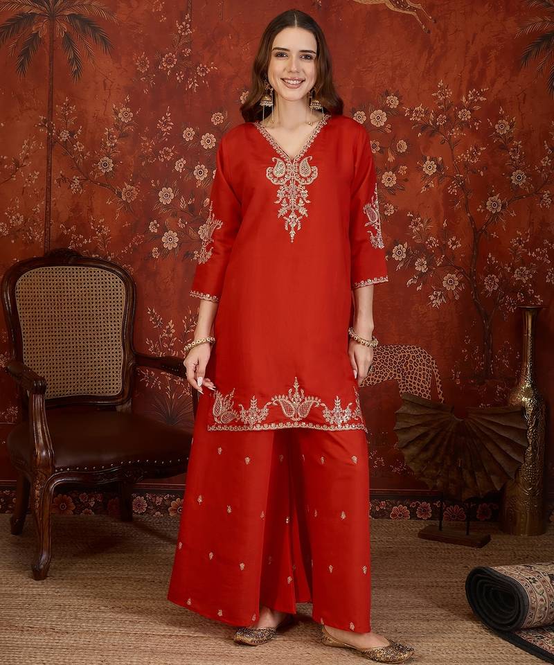 Red silk blend embroidered kurta plazzo set with dupatta.