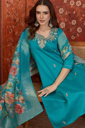 Blue silk blend embroidered kurta set with dupatta.