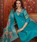 Blue silk blend embroidered kurta set with dupatta.