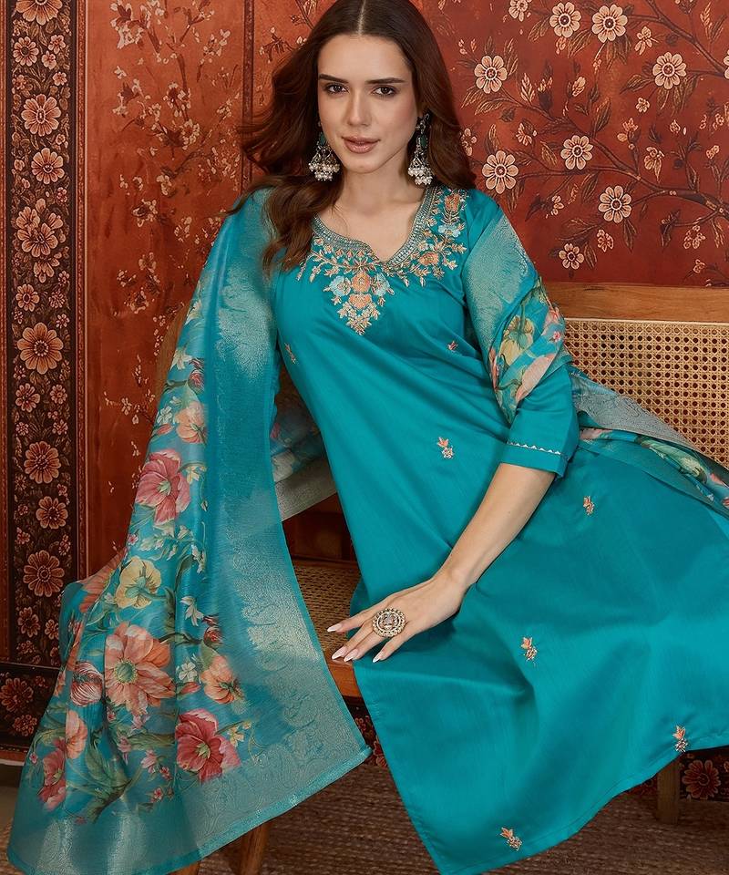 Blue silk blend embroidered kurta set with dupatta.