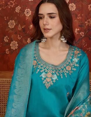 Blue silk blend embroidered kurta set with dupatta. 4
